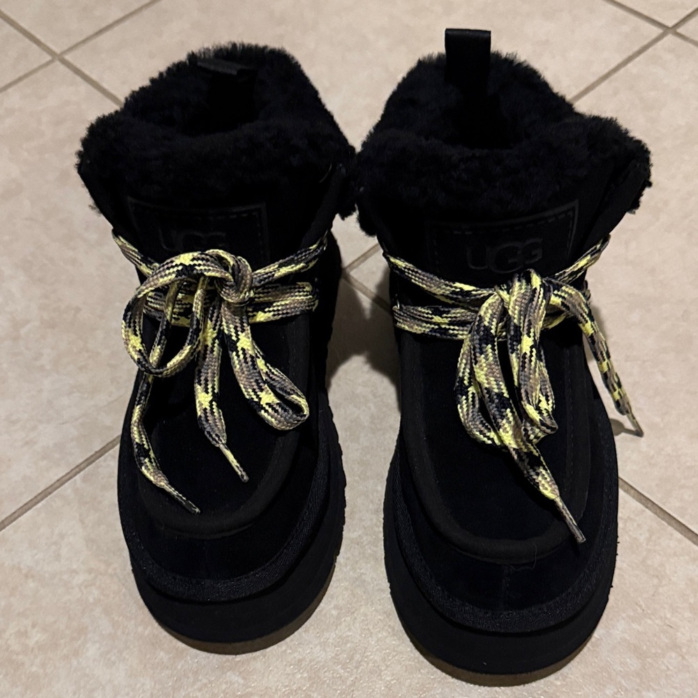 UGG women’s Black Shearling-Lined Boots with Yellow-Gray sold out in stores